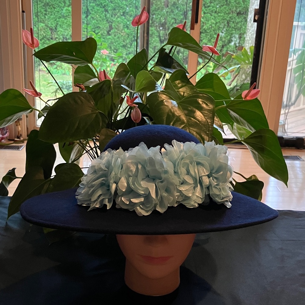 Elegant Navy Hat with Light Blue Floral Accent